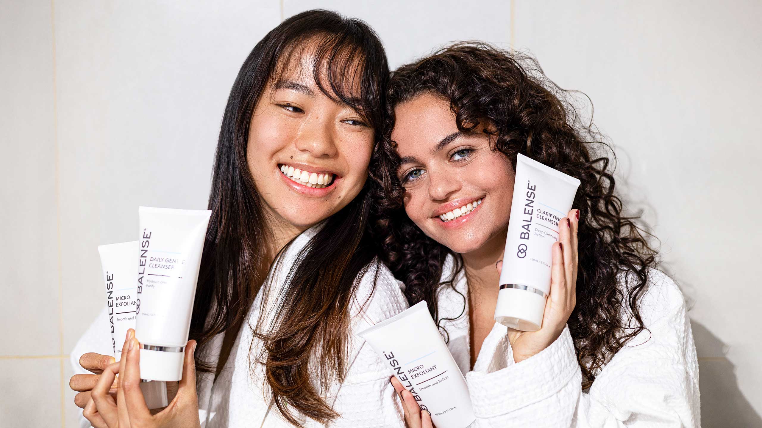 Two Ladies Holding Balanse Skincare Products