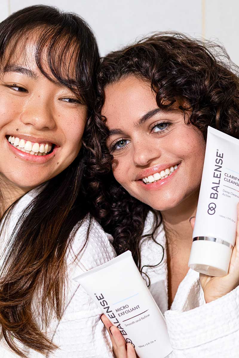 Two Ladies Holding Balanse Skincare Products